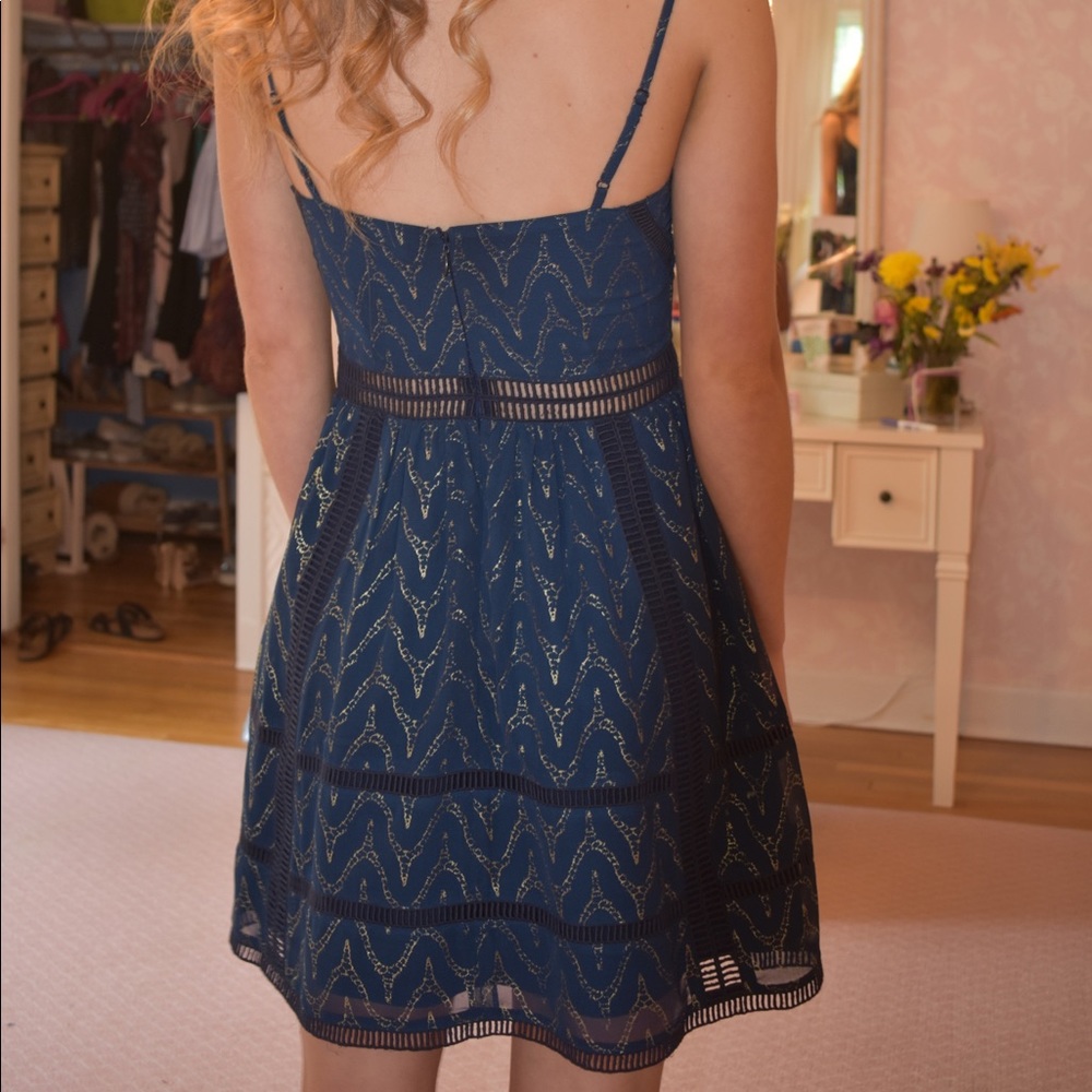 NBD navy and gold party dress